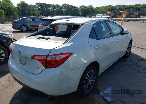2018 Toyota Corolla Le z USA, uszkodzony, nr VIN 5YFBURHE6JP804554